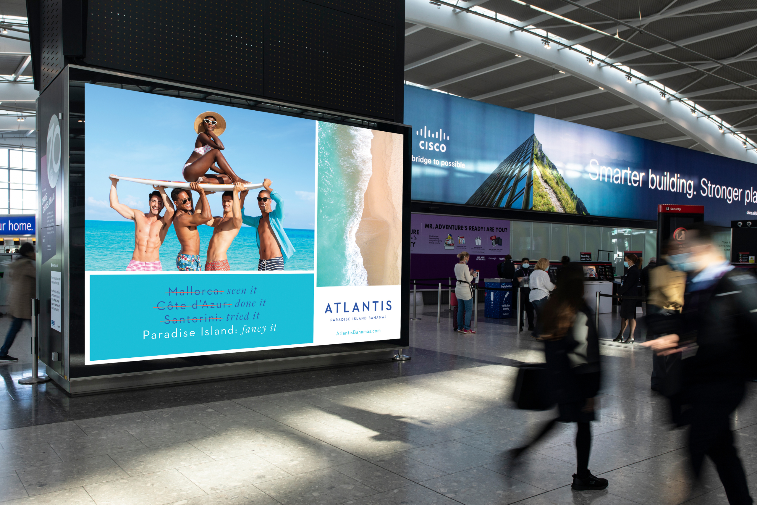 Atlantis backlit billboard in Heathrow airport